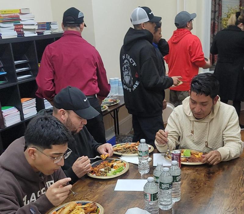 Students sharing a meal together at the center