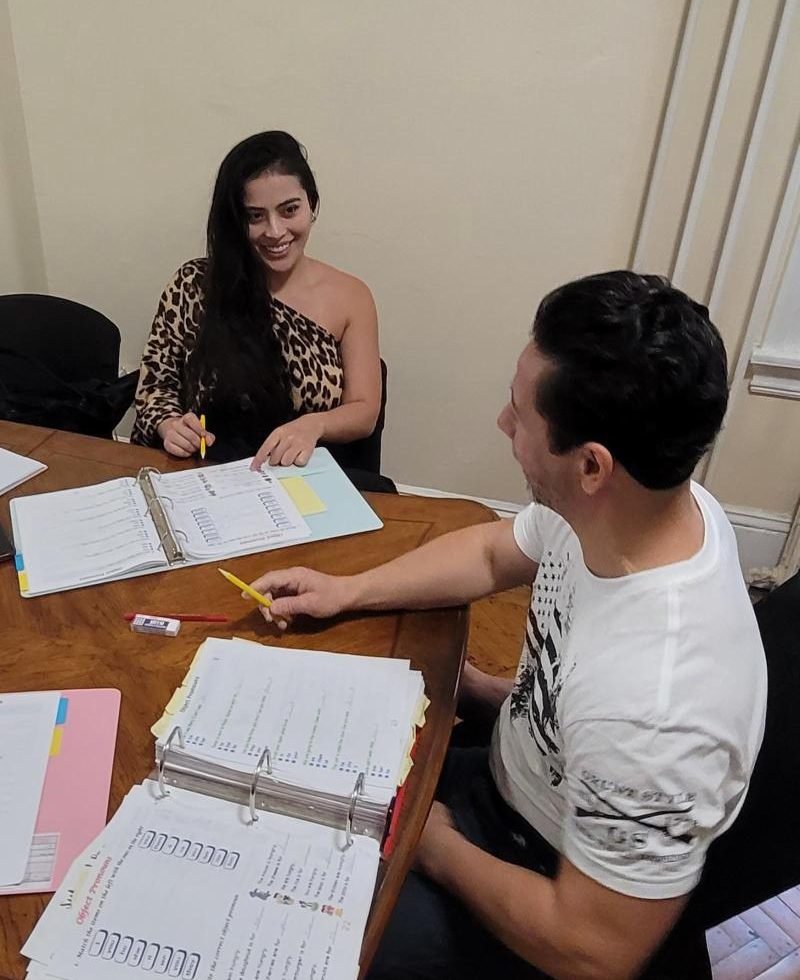 Professor David teaching a student one-on-one